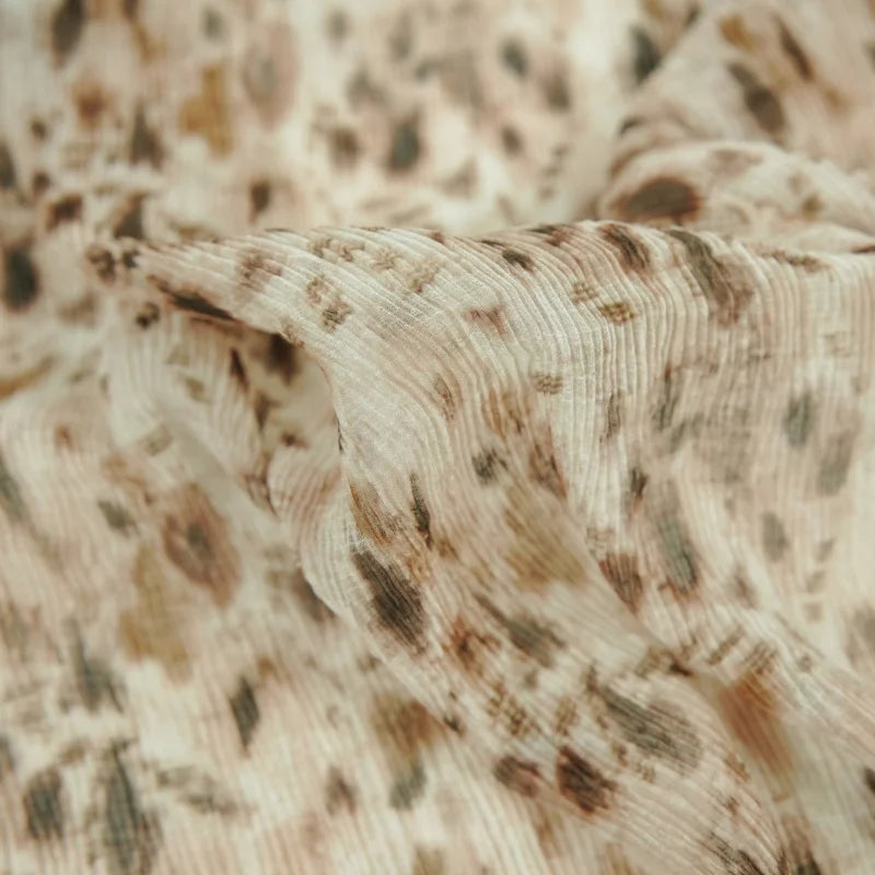 Semi-transparent, draping, light brown printed pleated textured fabric for dresses, shirts, pants, cheongsams, designer fabricsA